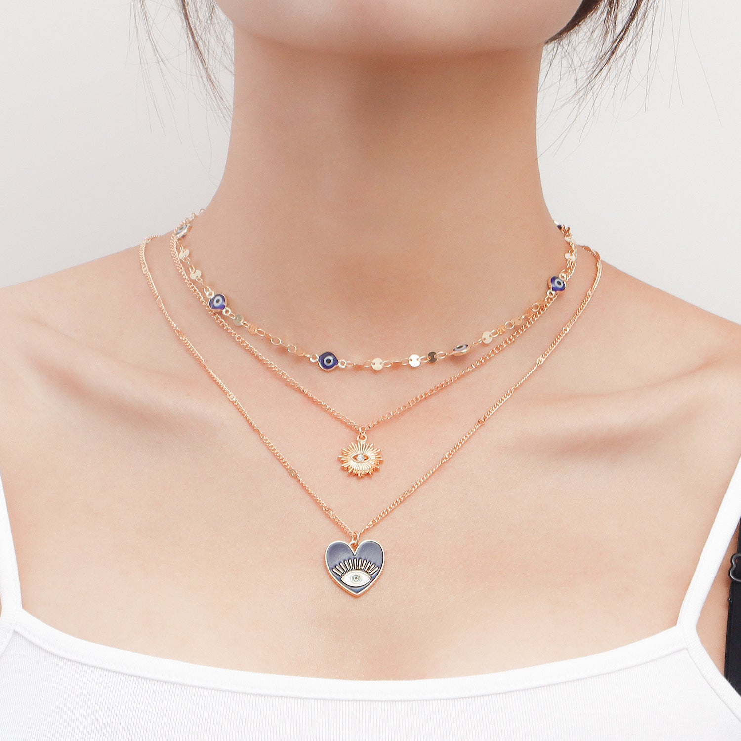 Heart Evil Eye Necklace, Multi-layer Necklace Set, featuring 3 different Evil Eye designs.