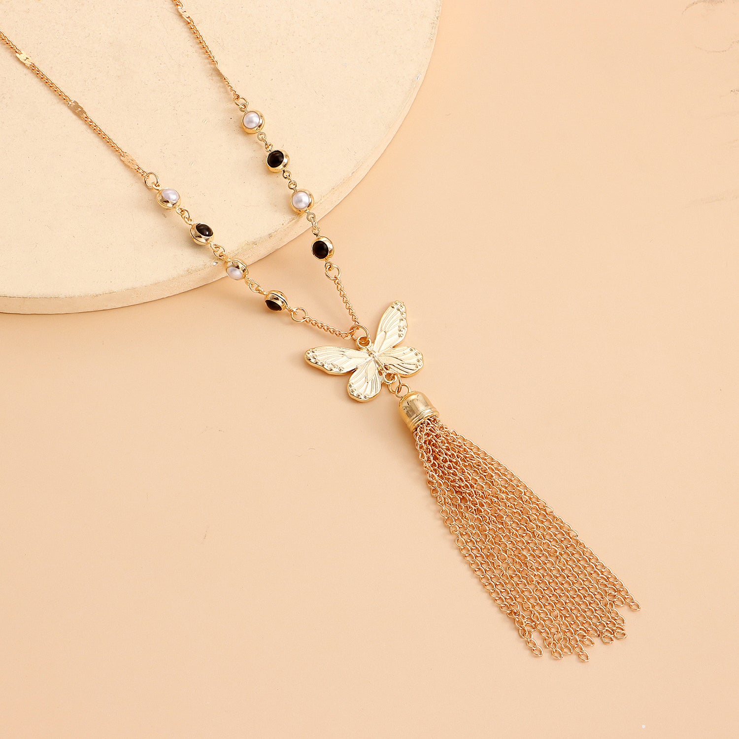 Butterfly long tassel necklace for women, with outer chain design