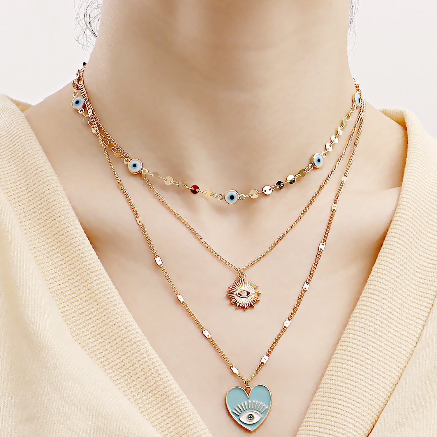 Heart Evil Eye Necklace, Multi-layer Necklace Set, featuring 3 different Evil Eye designs.