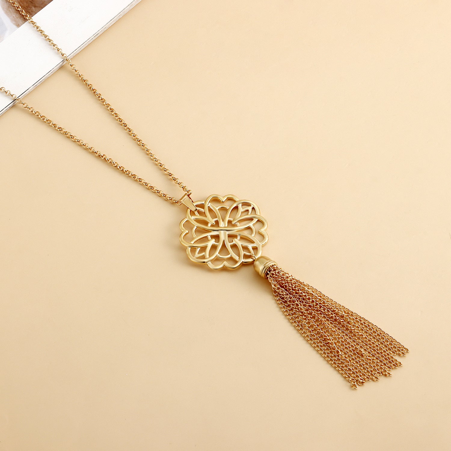 &quot;Elegant Long Hollow-Out Lotus Tassel Necklace for Women, Minimalist Autumn/Winter Sweater Chain, Yoga &amp; Meditation Accessory