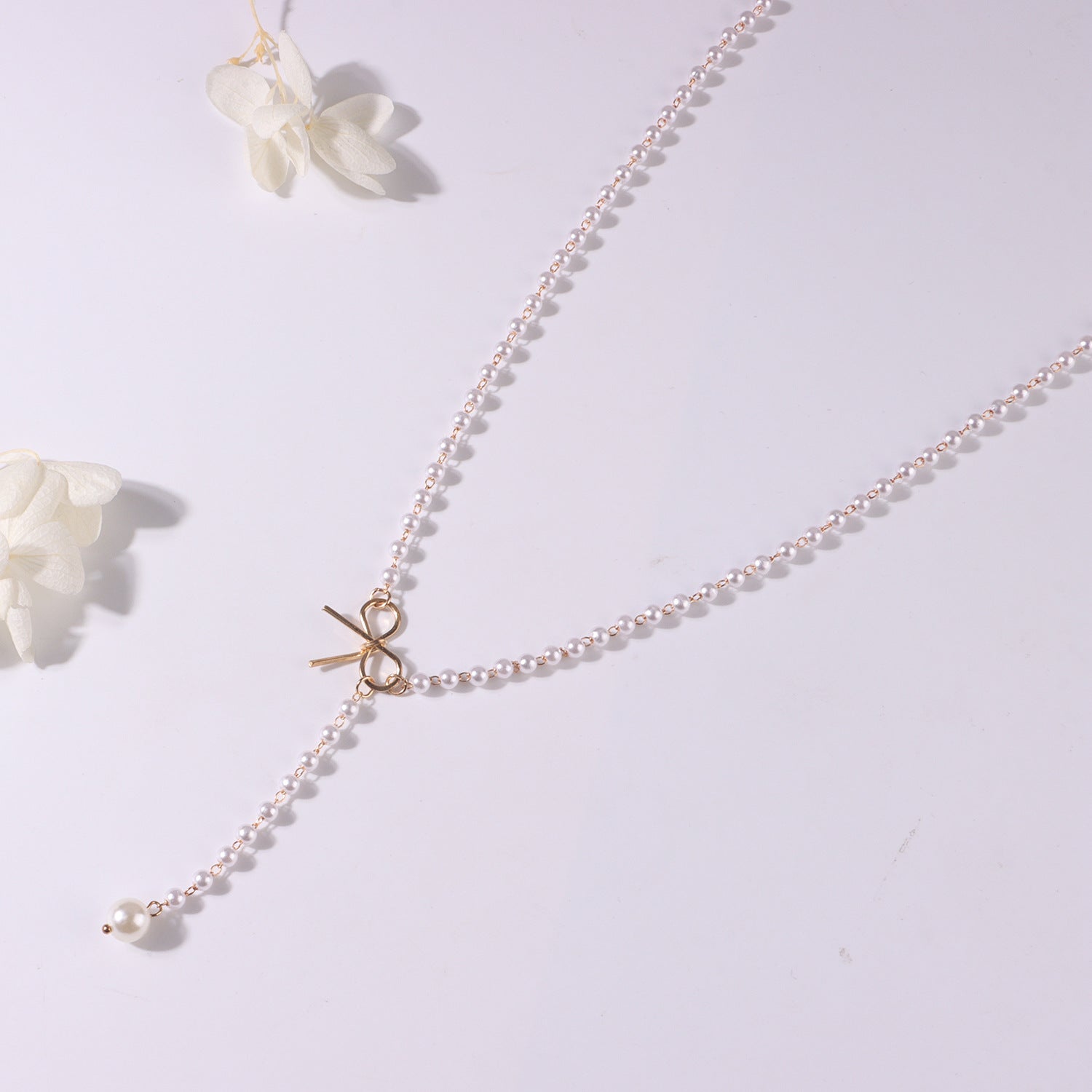 Gold-plated bow, pearl necklace, simple and stylish necklace