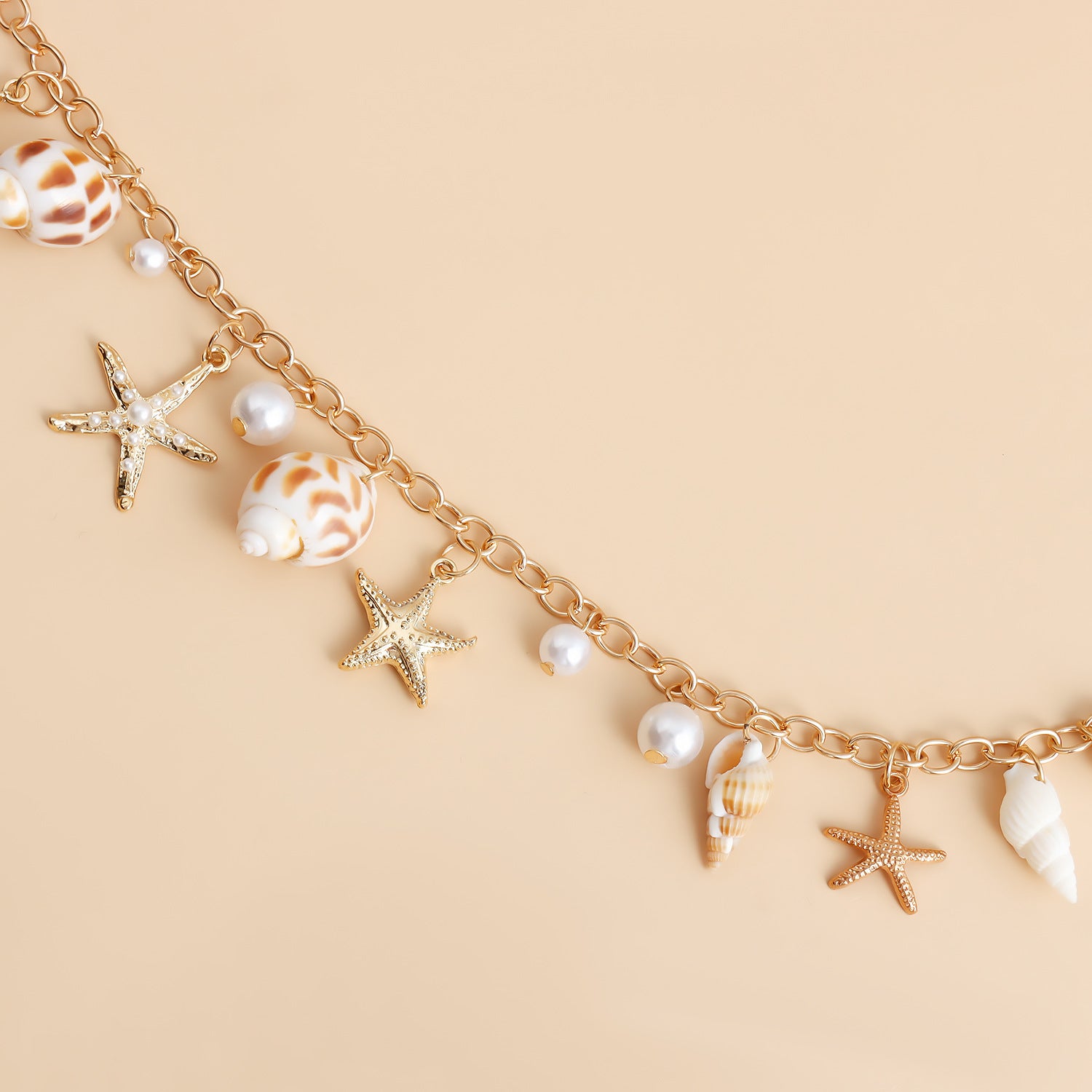 Bohemian Summer Beach Shell Waist Chain with Faux Pearl Starfish and Conch Pendants, Perfect for Coastal Trips Body Jewelry.