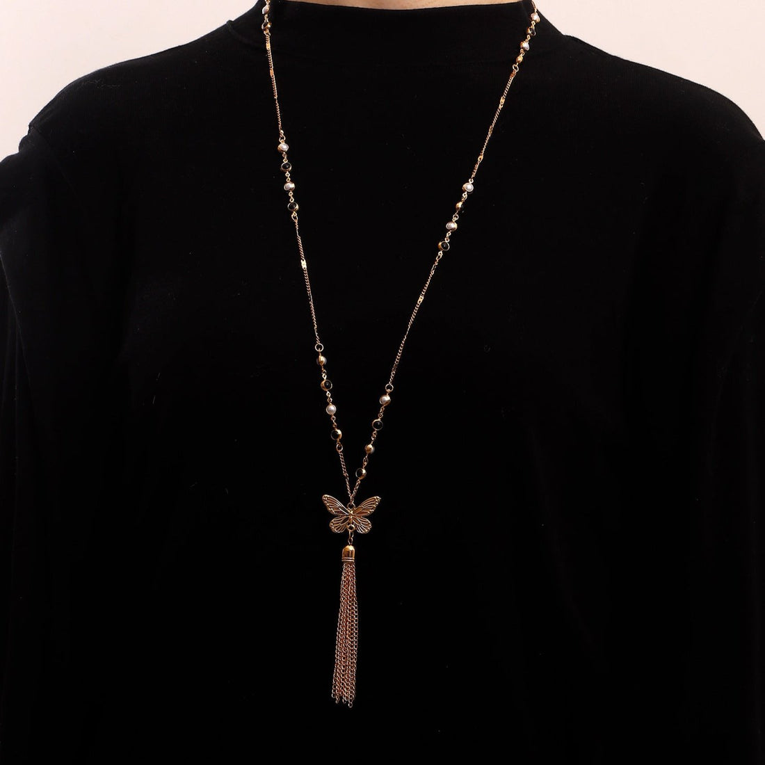 Butterfly long tassel necklace for women, with outer chain design